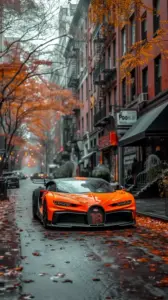 Trên đường đua tối, Bugatti Bolide lướt qua vệt sáng đỏ cùng thân xe carbon sắc gọn.