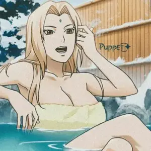 Mái tóc vàng của mỹ nhân Naruto bay nhẹ trong gió khi cô bước trên bãi cát sáng